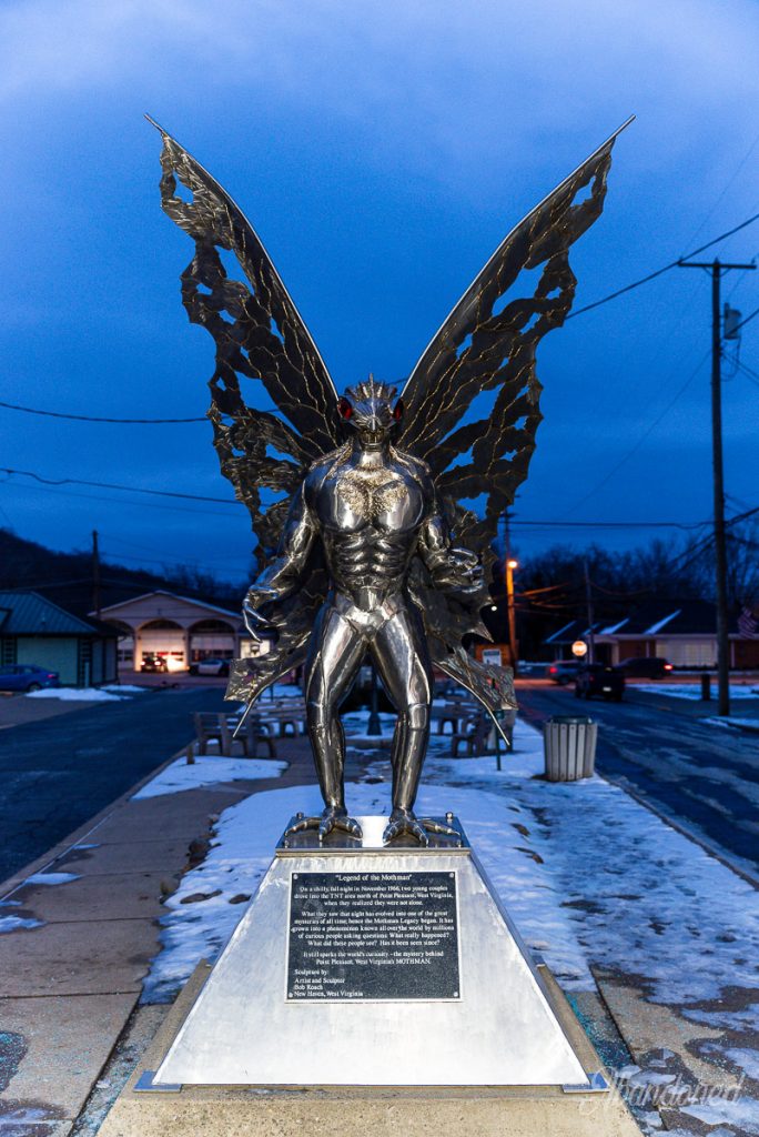 This is a photo of a Mothman stainless steel statue.